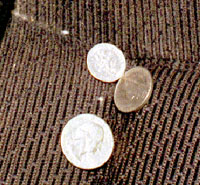 Coins on seating surface